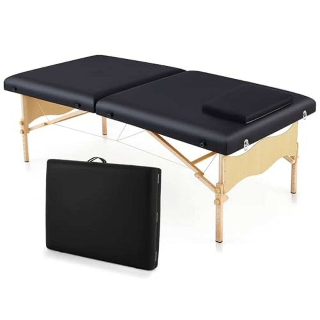 Low portable folding massage table with black padding and visible wooden legs