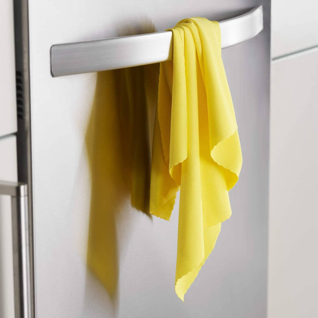 E-Cloth microfiber cleaning cloth, yellow cloth folded and hanging for polishing