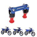 Blue CNC motorcycle handlebar riser clamps with red spacers and silver mounting bolts