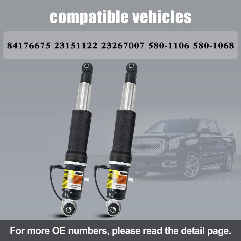 Rear air shock absorber pair with black bodies, silver rods, and top mounting eyes