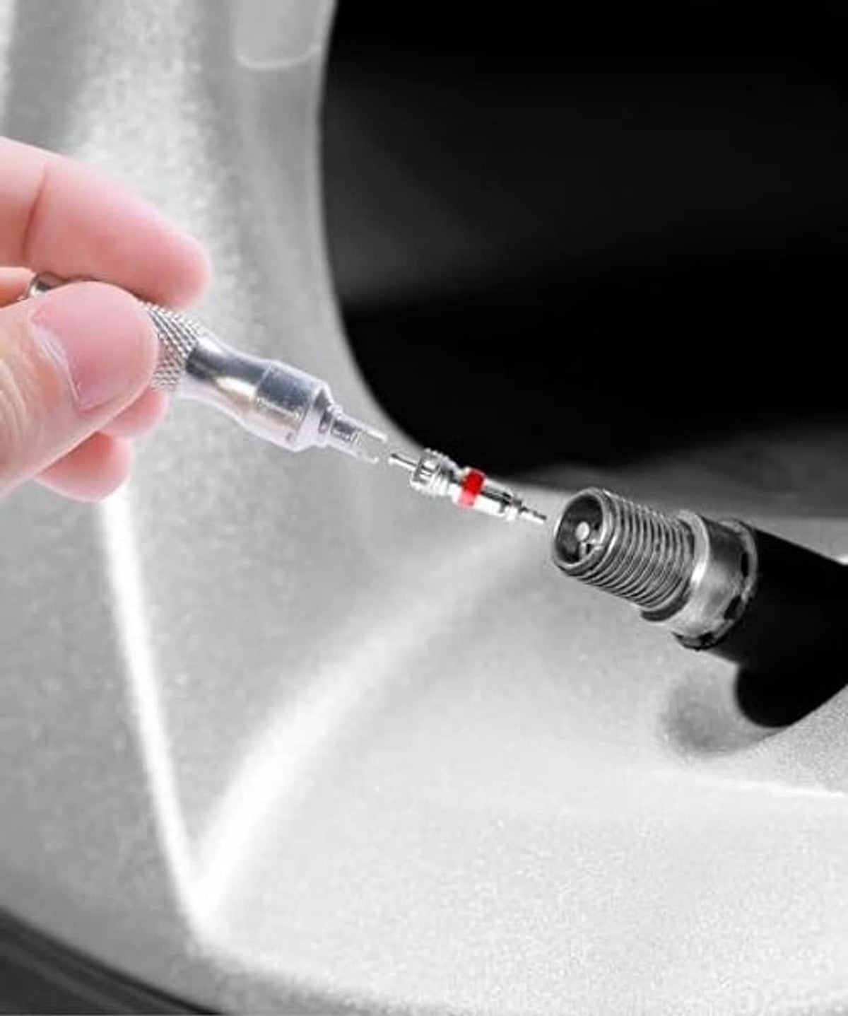 Valve core removal tool removing a core from a tire valve