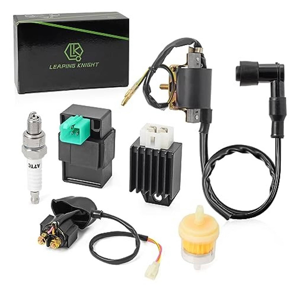 Ignition coil CDI and regulator kit laid out with cables, spark plug, and connectors