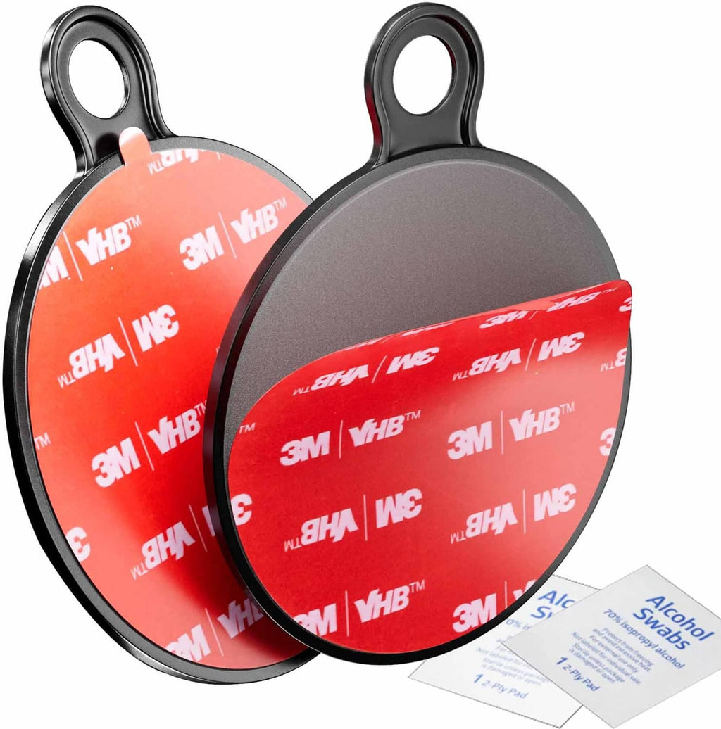 Pair of dashboard mounting disks: red adhesive side and black suction cup, with included wipes.