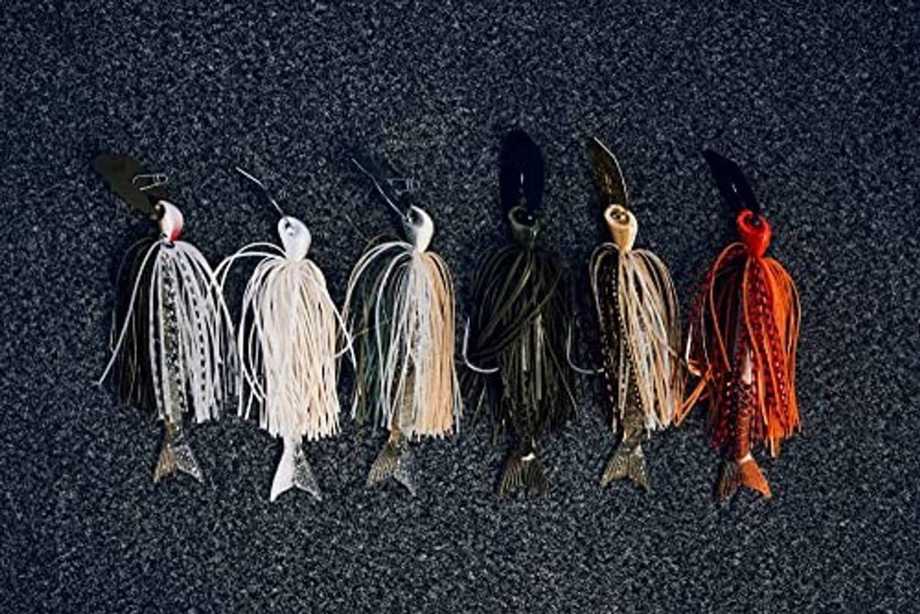 Assorted bladed fishing jigs with skirt and hooks in multiple colors