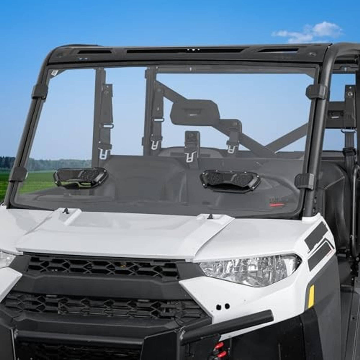Side view of UTV sliding scratch vented windshield with clear panel and dark frame