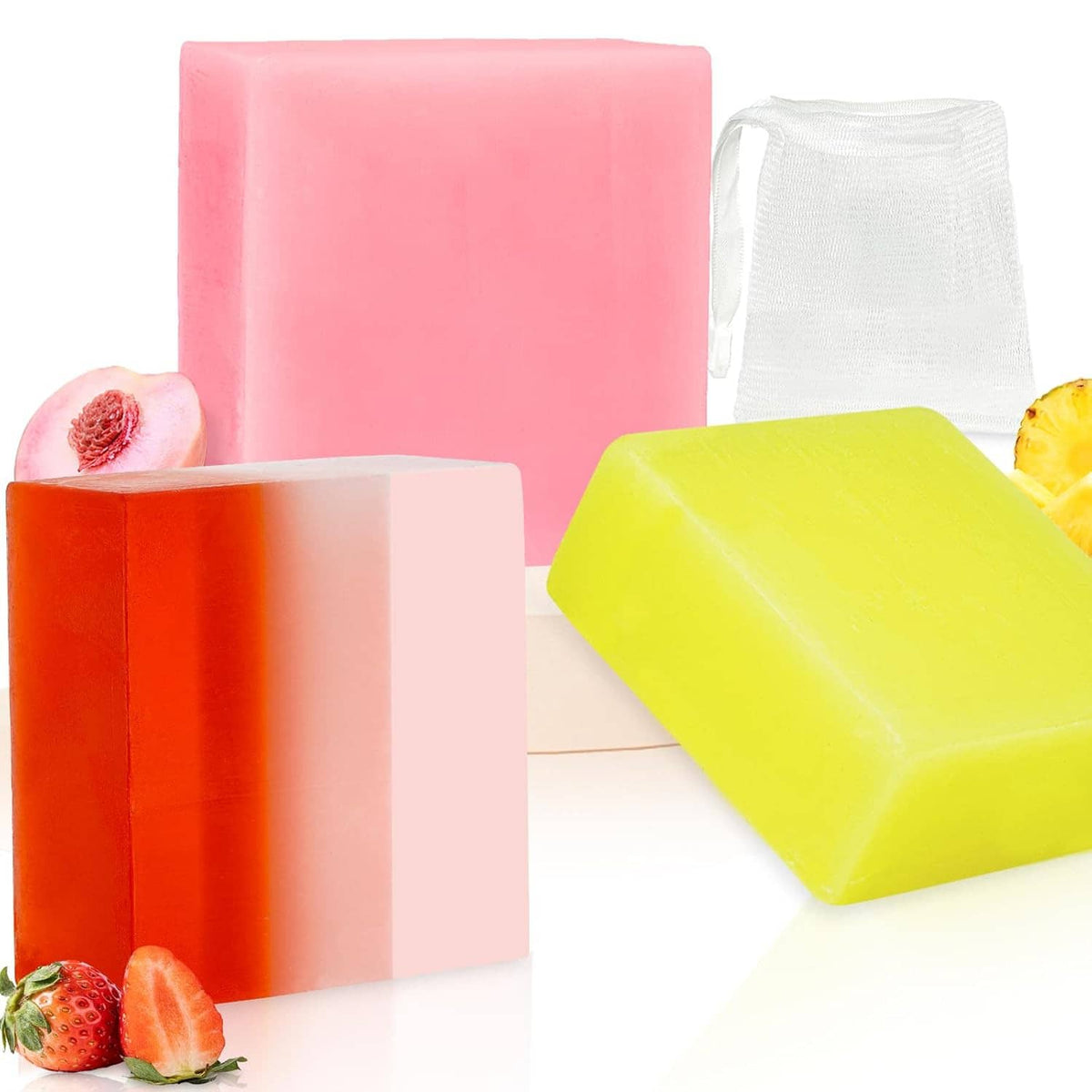 Three-color yoni soap bar set: pink, orange, and yellow bars with white mesh bag