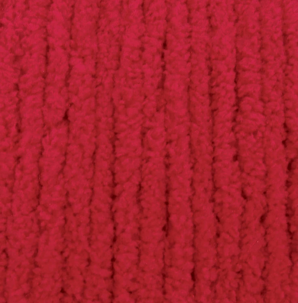 Race car red chenille yarn texture with thick, looped stitches