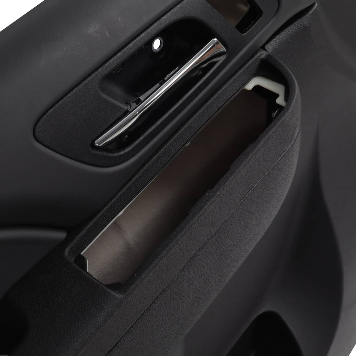 Door trim panel interior handle bezel with inner latch recess, black textured finish.