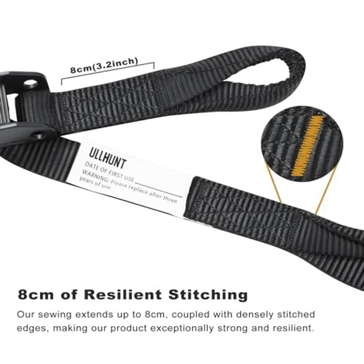 Black webbing strap with stitched edge and label tag, close-up