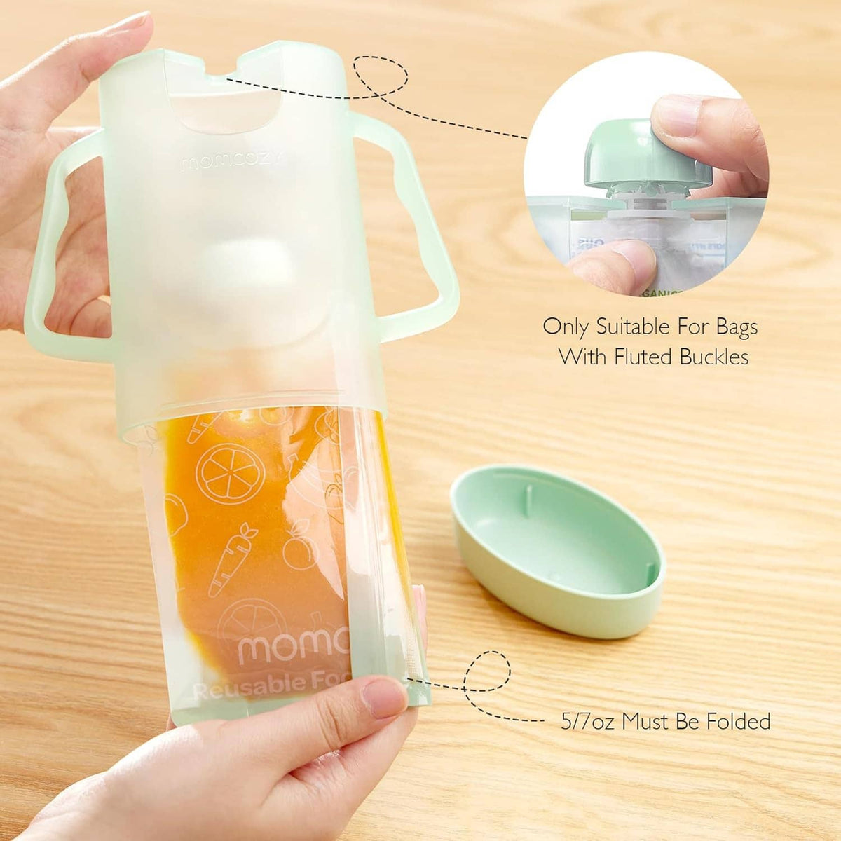 Reusable baby food pouch bag with green puree filling accessory on table