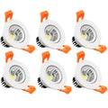Set of recessed LED downlights with white housings and orange spring clips