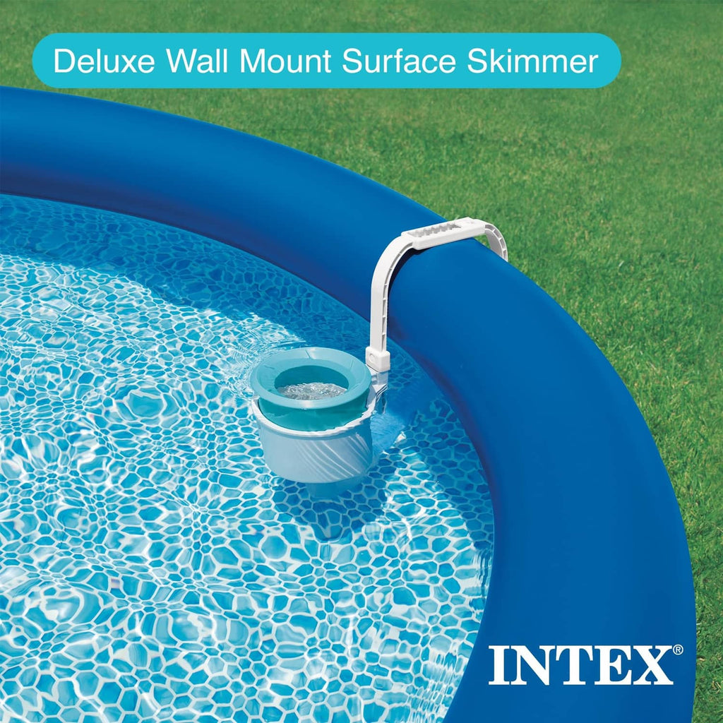 Wall-mounted pool skimmer installed at pool edge with blue collection basket