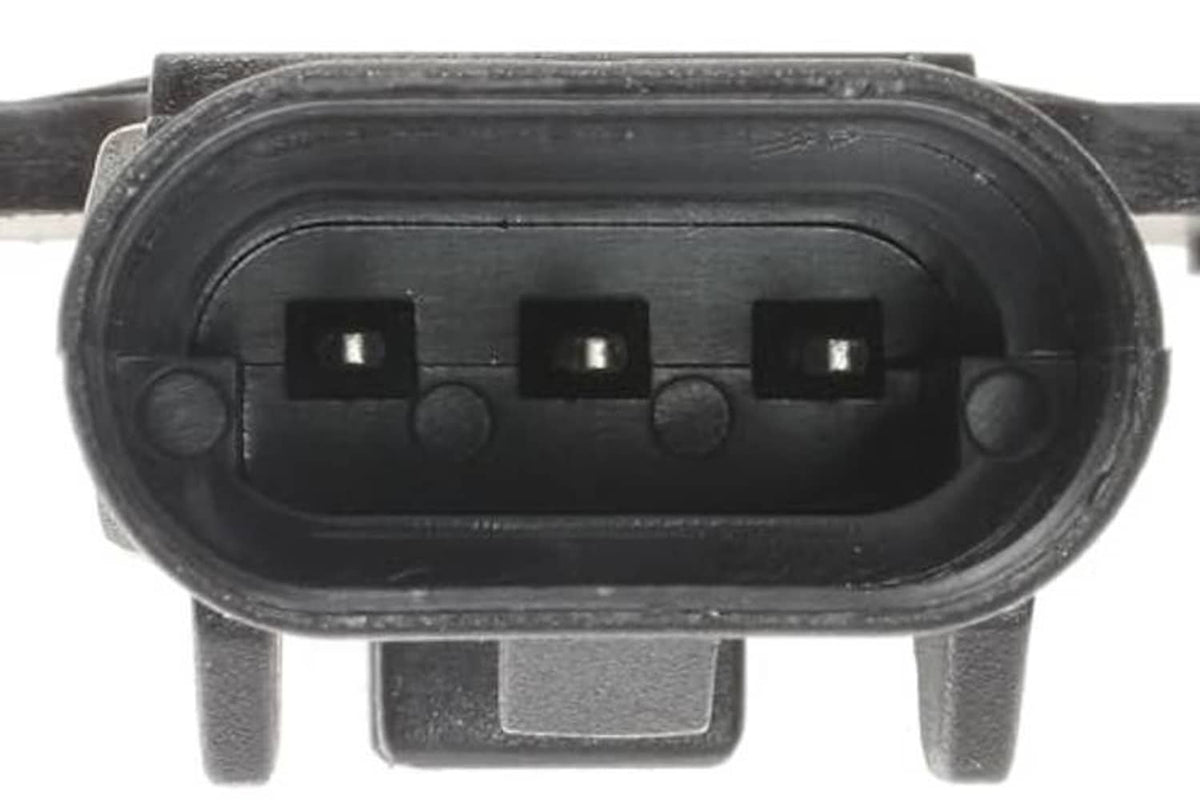 Engine camshaft position sensor connector face with four contacts in black housing