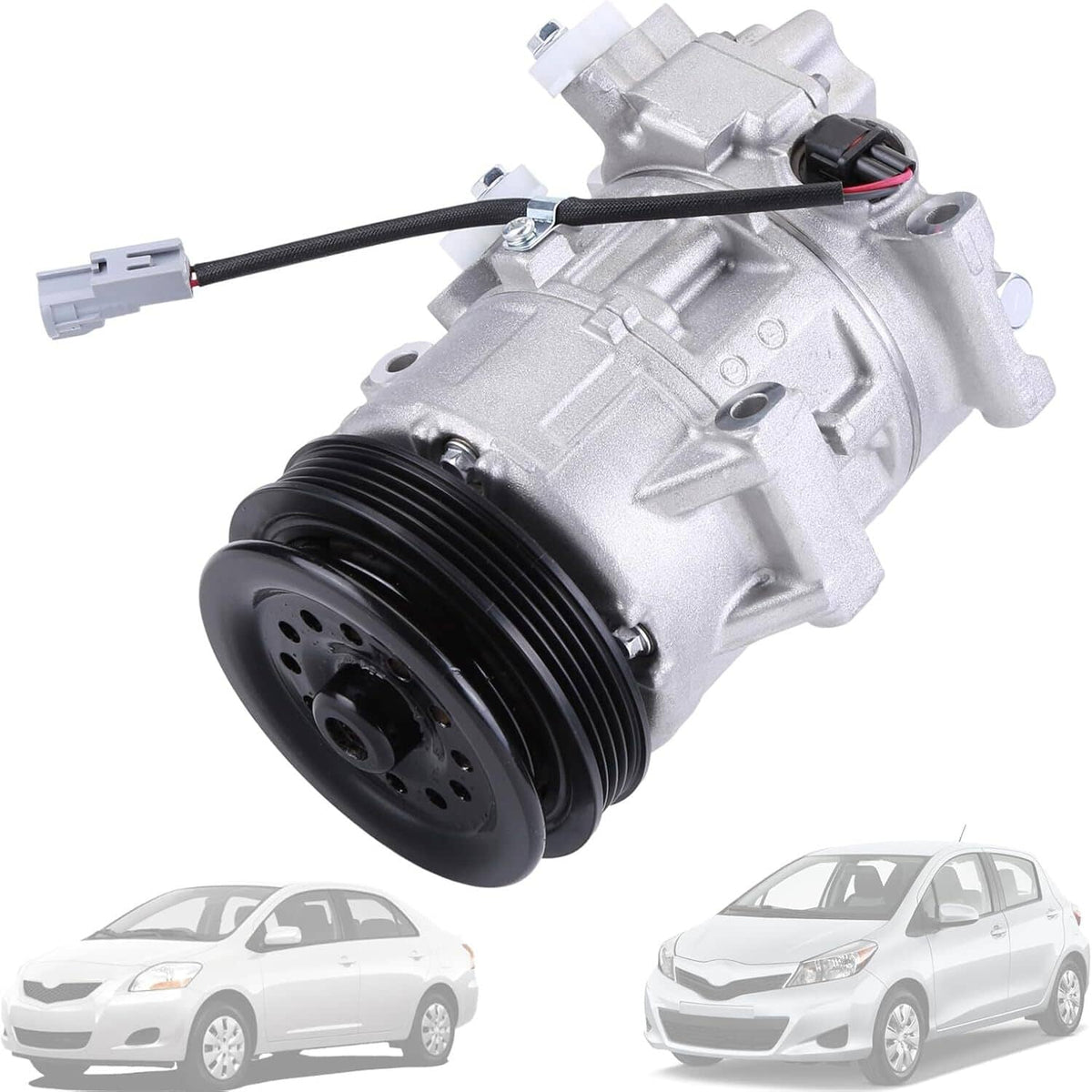 A/C compressor with black pulley and wiring harness on silver metal housing.