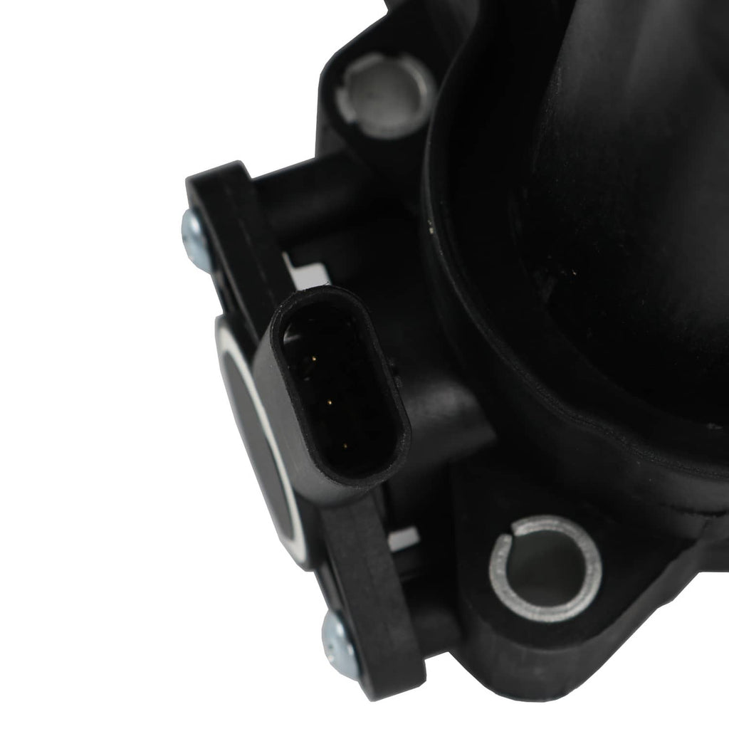 Black intake manifold sensor port with mounting bracket and metal fasteners