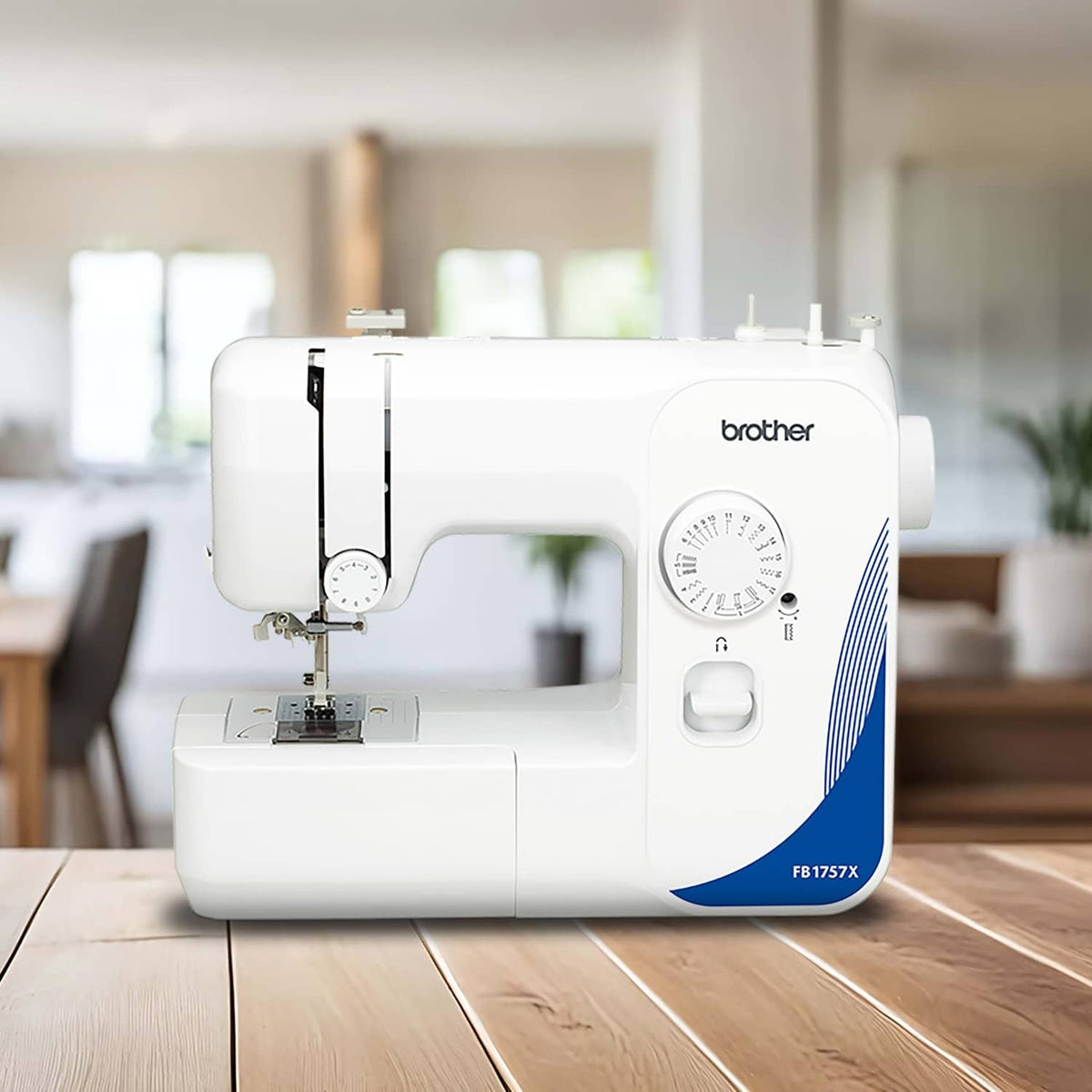 White Brother mechanical sewing machine on a tabletop, front view with blue side panel