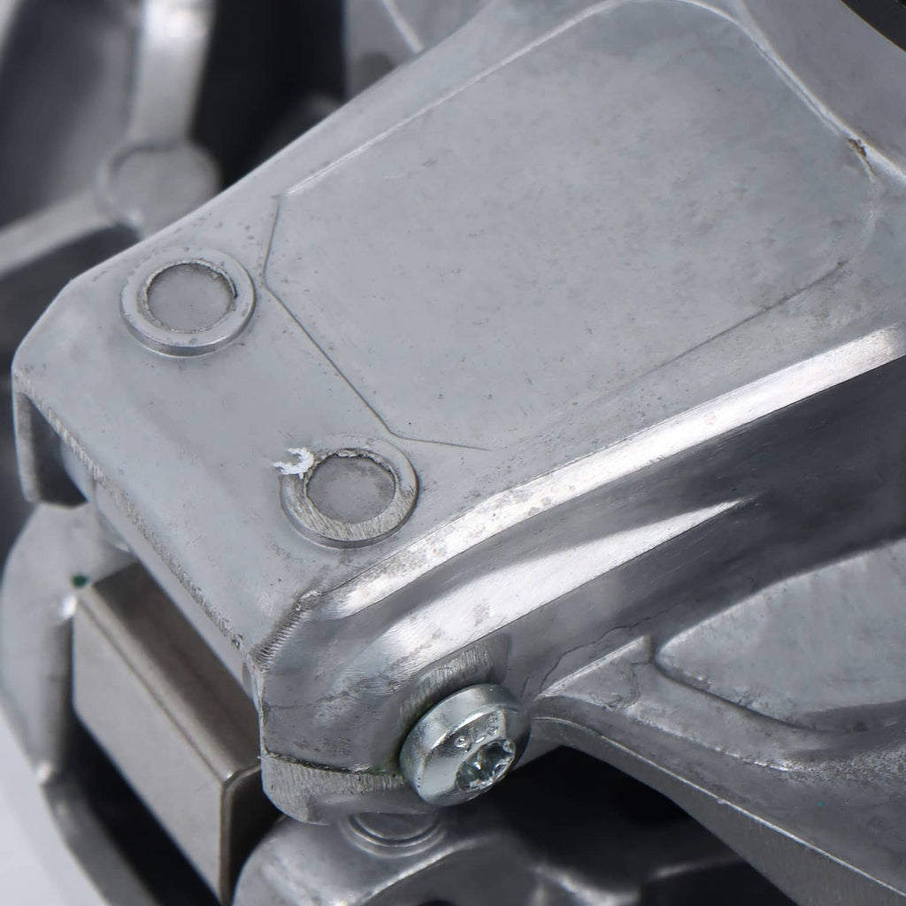 Metal clutch assembly bracket with fasteners and central mounting bolt, close-up
