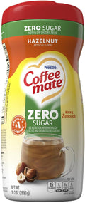 Coffee-mate Zero Sugar Hazelnut creamer bottle, red cap with green label front