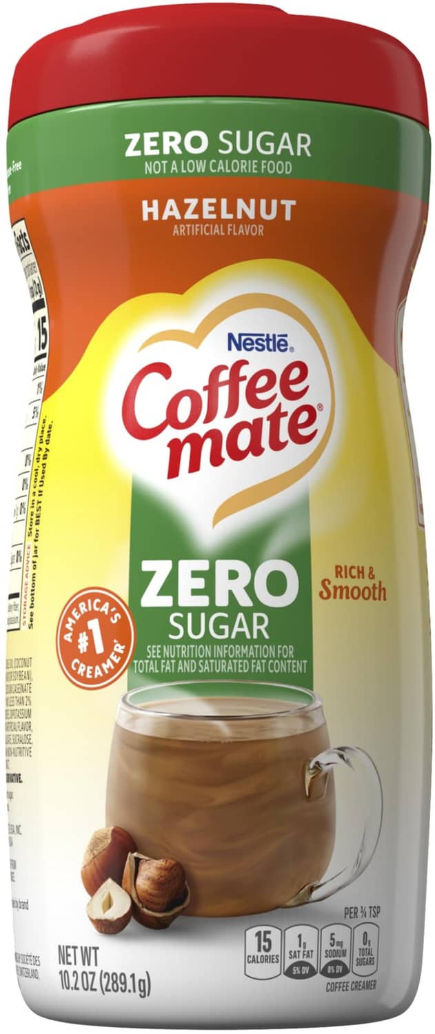 Coffee-mate Zero Sugar Hazelnut creamer bottle, red cap with green label front