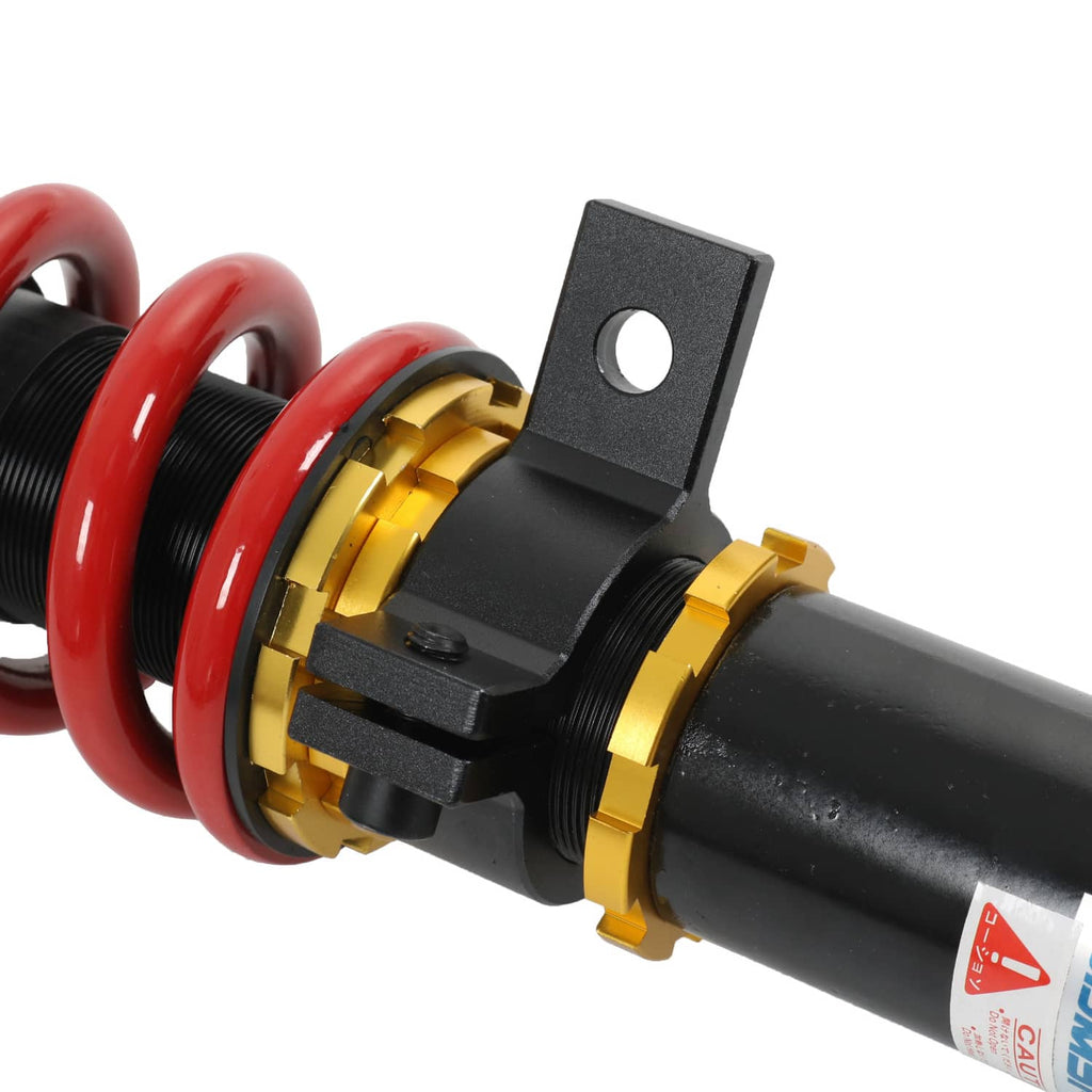 Coilover spring perch with red coil spring, black housing, and gold adjust collar