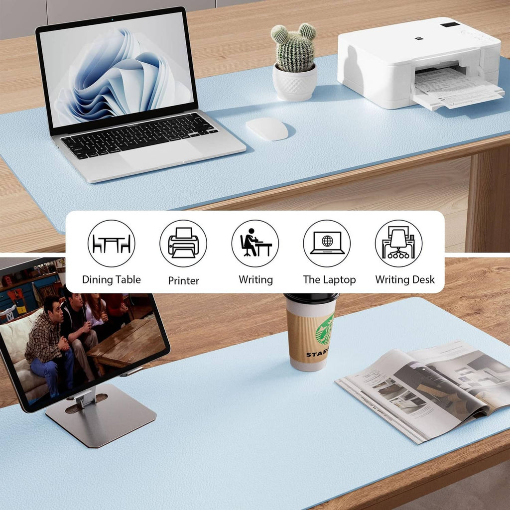 Baby blue desk pad protector on desk with laptop and printer nearby