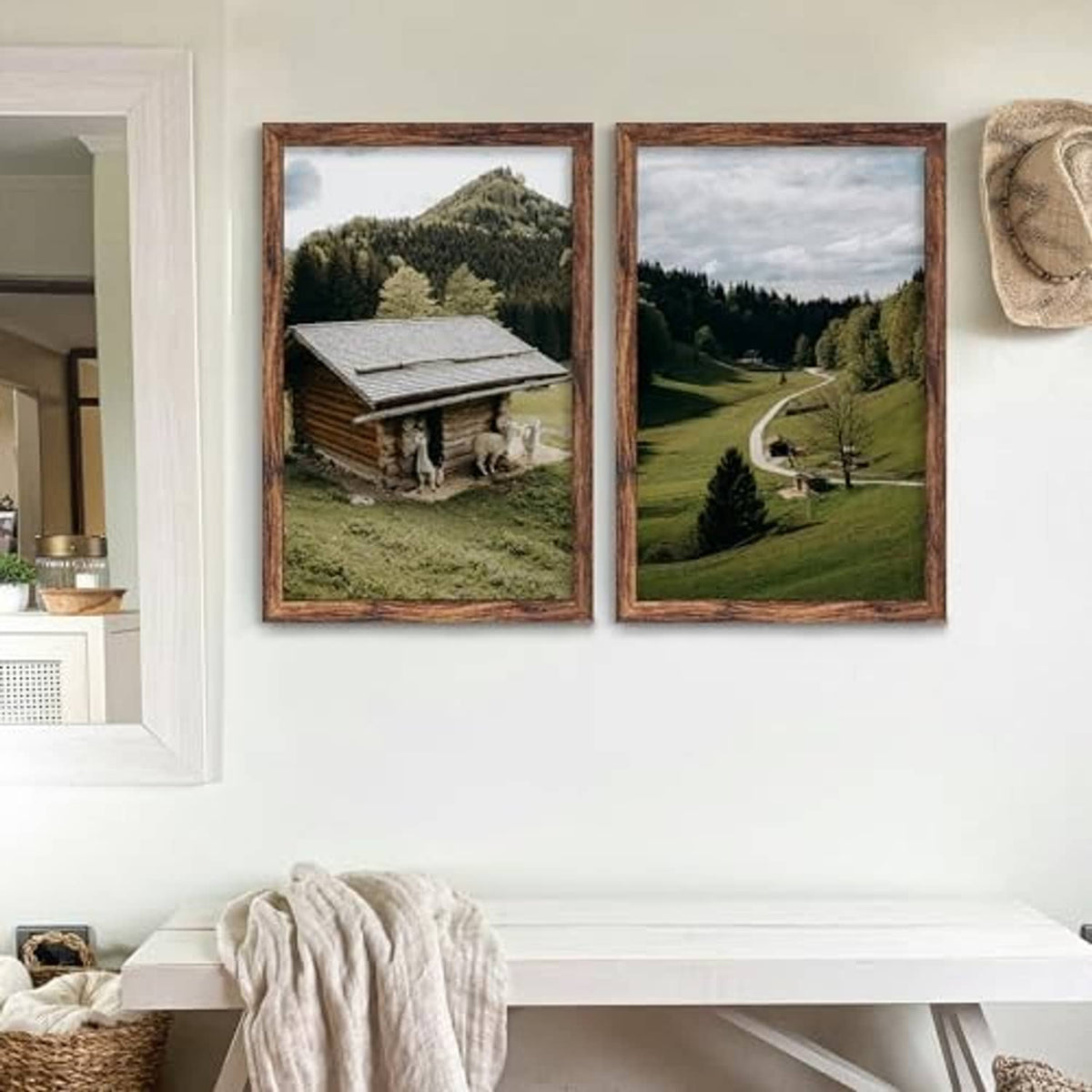 Brown picture frame set with two vertical landscape prints on display