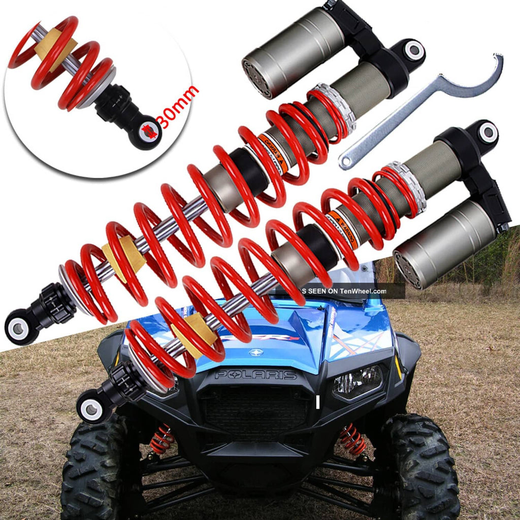 Adjustable front shocks with red coil springs, gray dampers, and side adjustment tool