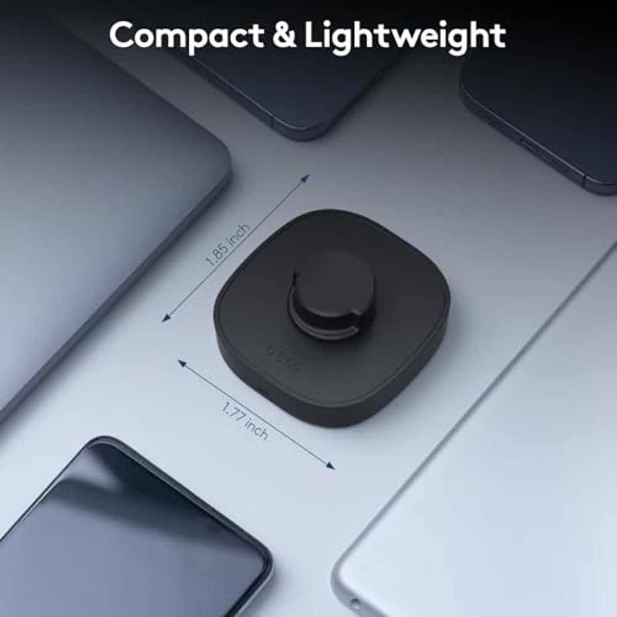 Compact black smart ring charger dock with size indicators and USB-A cable