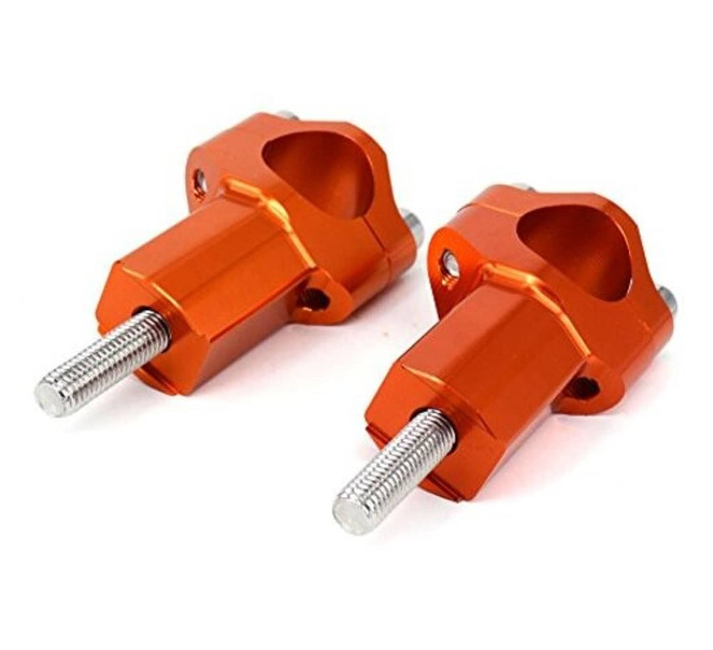 Orange handlebar riser bar mounts with long threaded screws and central bore openings