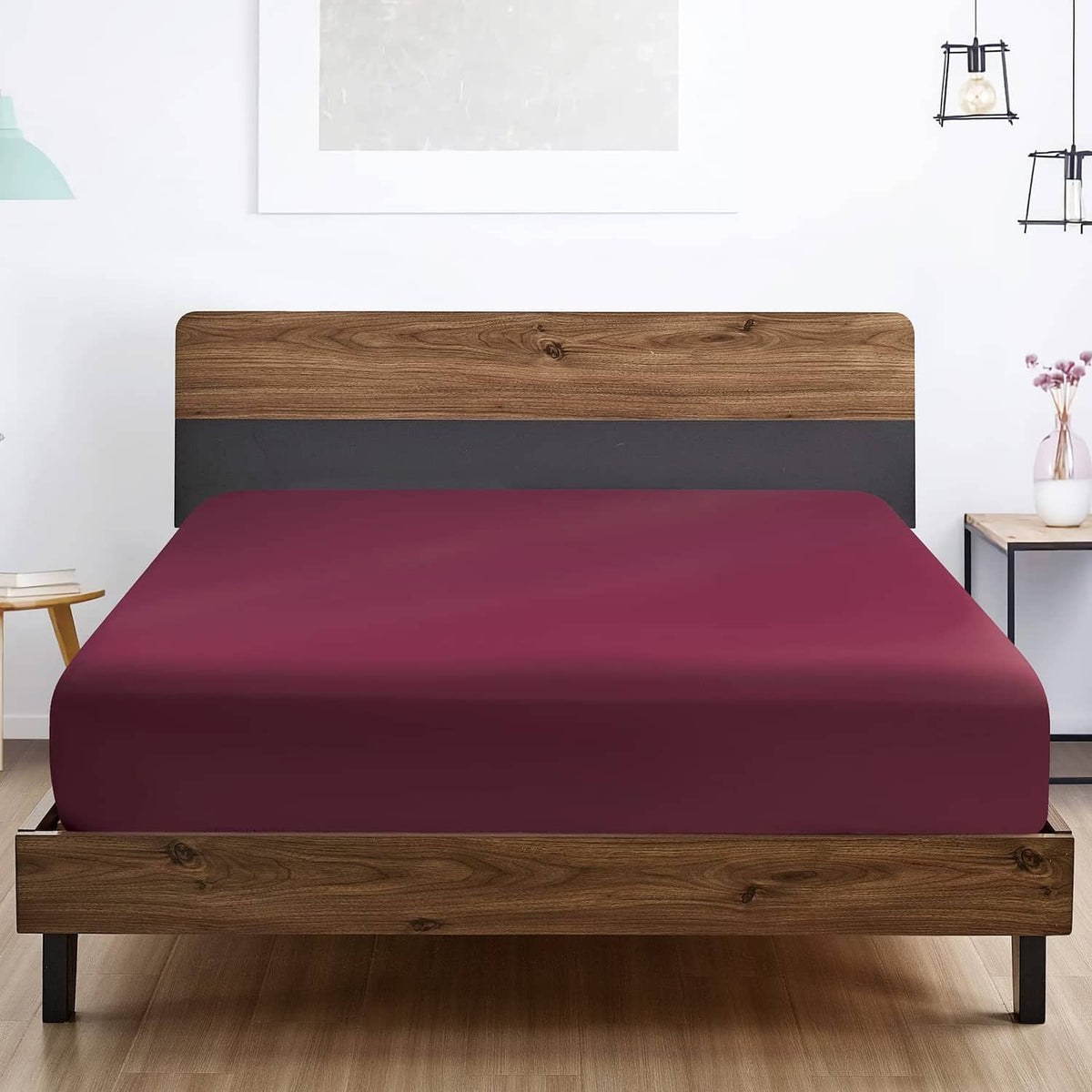 Burgundy queen fitted sheet on bed, smooth flat top