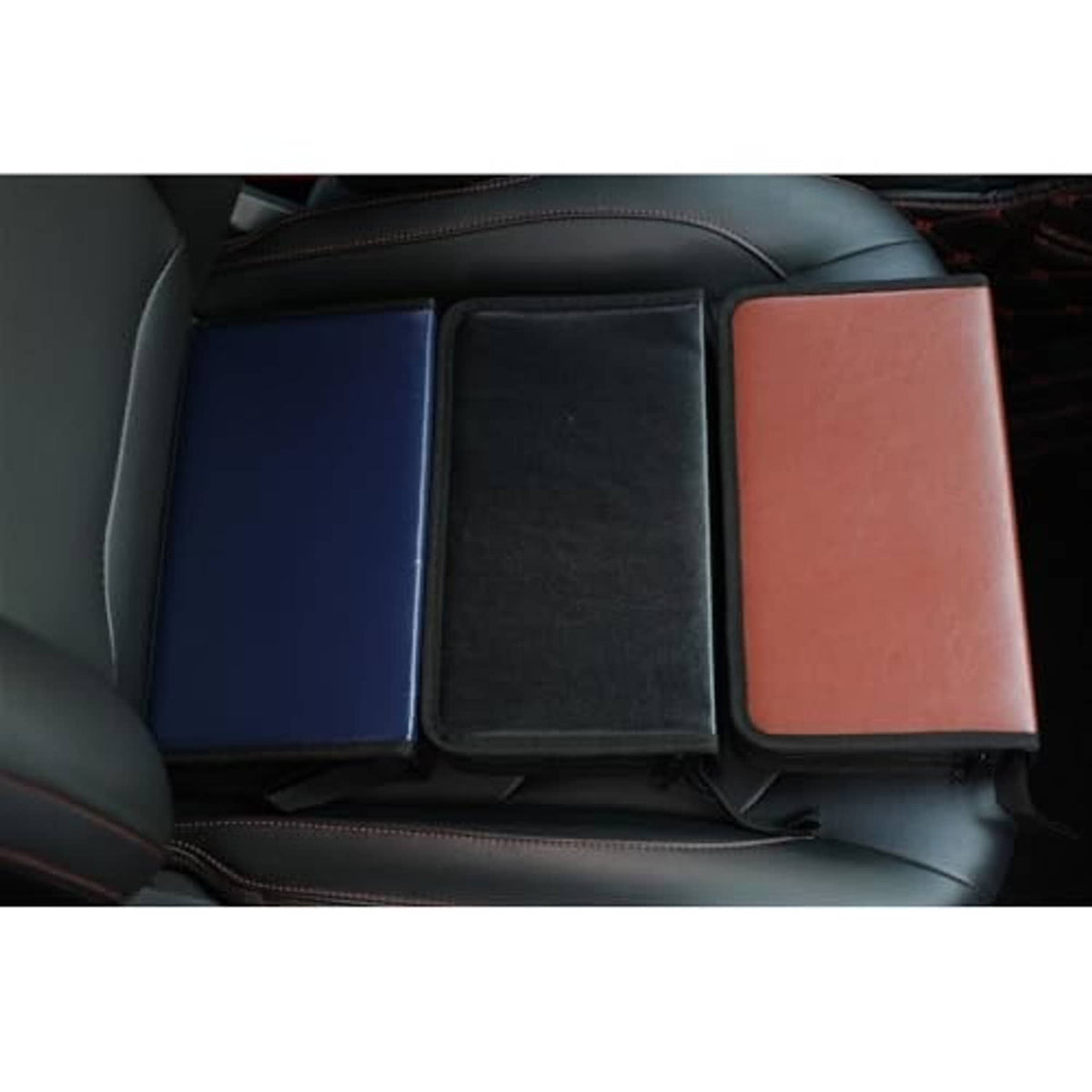 PU leather CD/DVD cases in car seat pocket: blue, black, and red with zippers