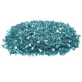 Aqua blue fire pit glass, reflective crushed glass stones in a loose pile