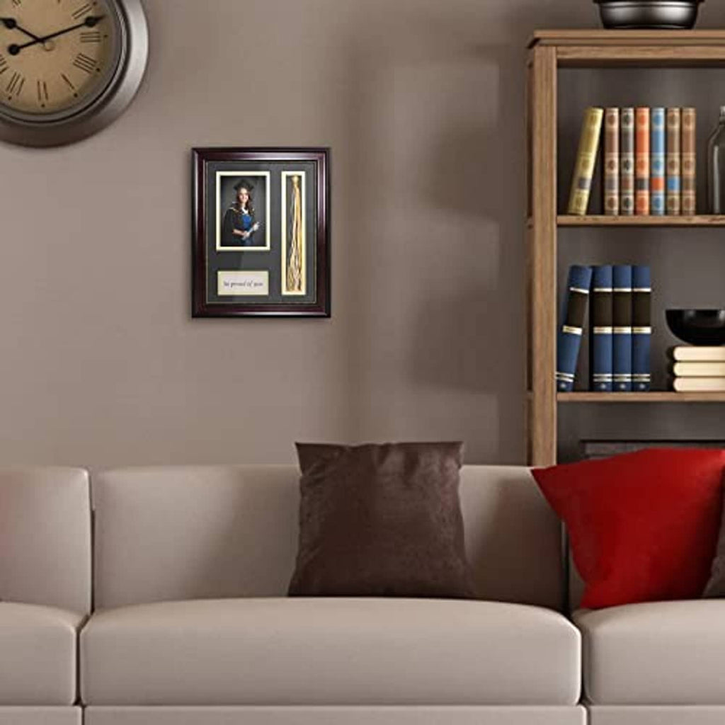 Graduation photo shadow box frame with tassel holder on wall display in living room