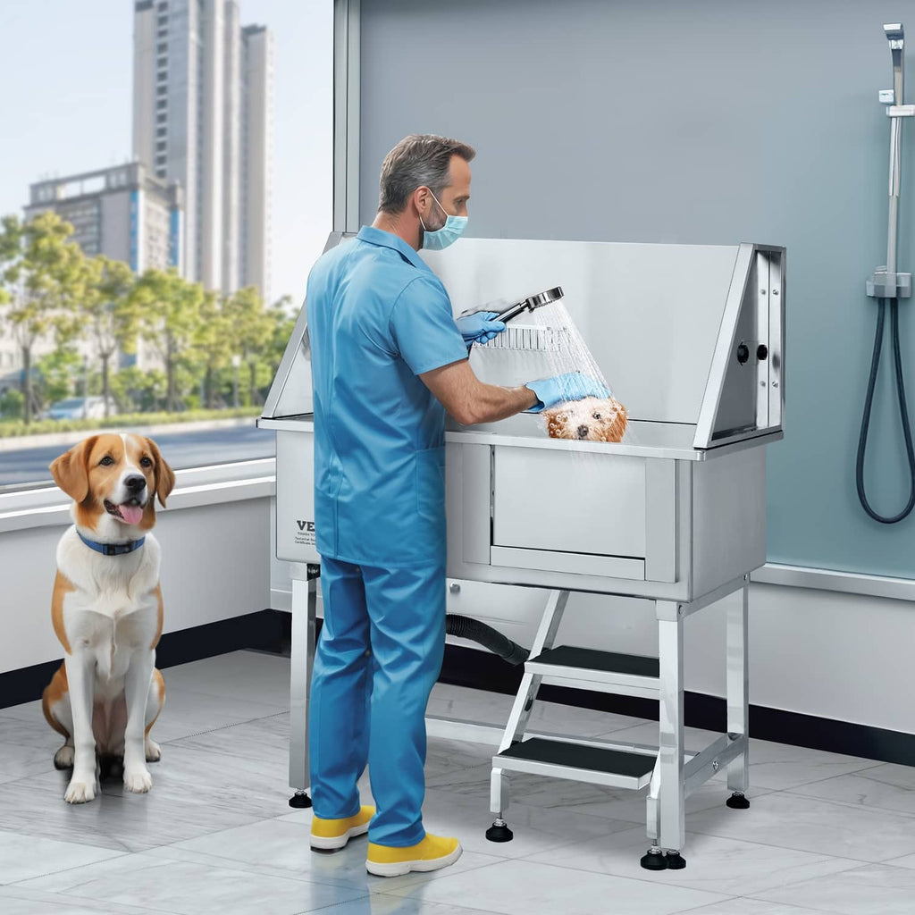 Stainless steel pet grooming bath tub with steps, soap tray, and hose connection