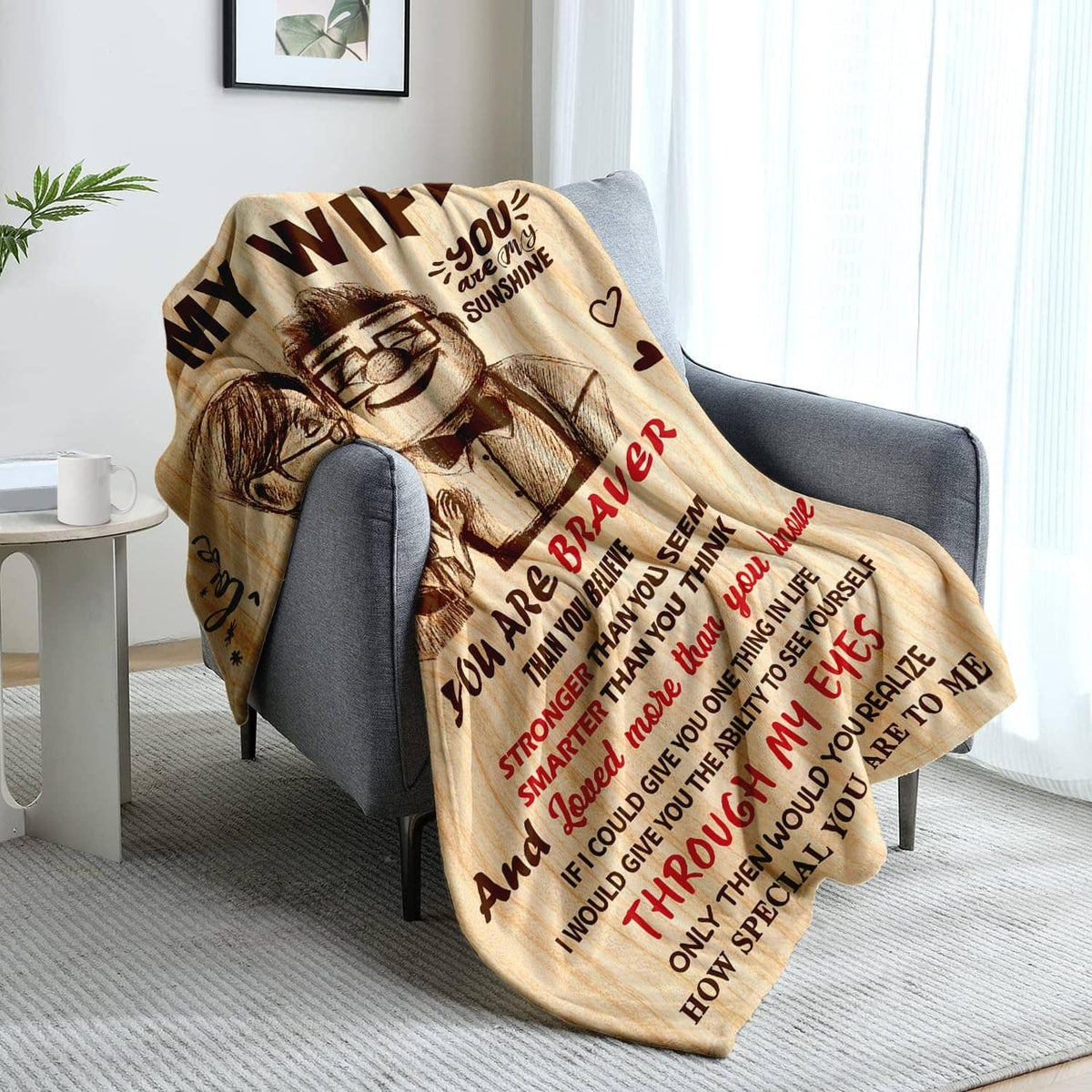 To My Wife throw blanket folded on a sofa with couple illustration and heart accents
