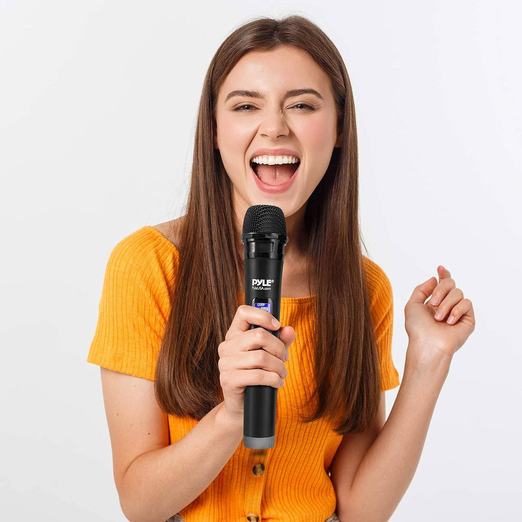 Handheld wireless microphone with Pyle logo held for singing or karaoke use