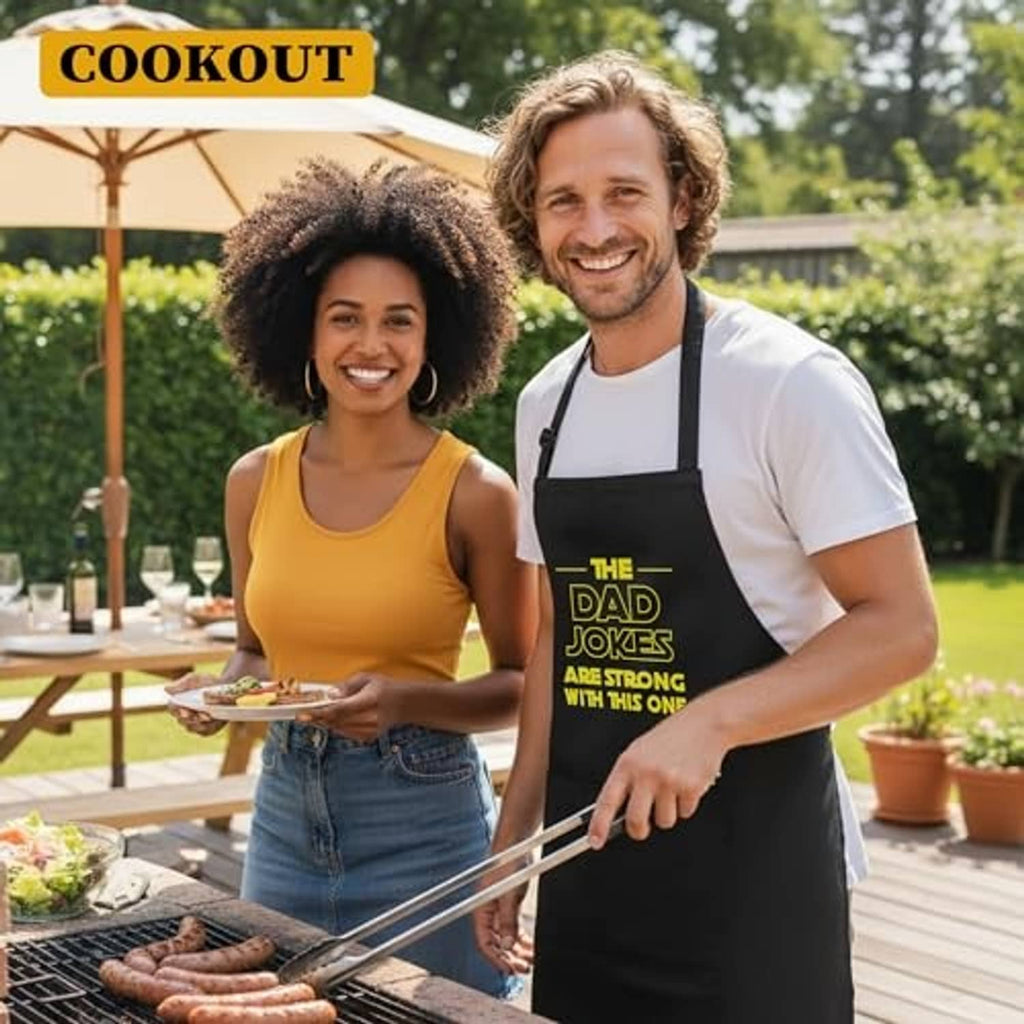 Black grilling and cooking apron with adjustable neck strap and front pocket