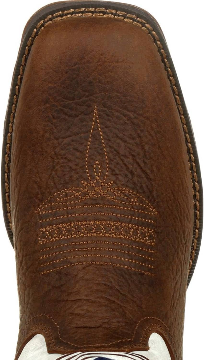 Brown leather western boot toe with decorative stitching and small center emblem.