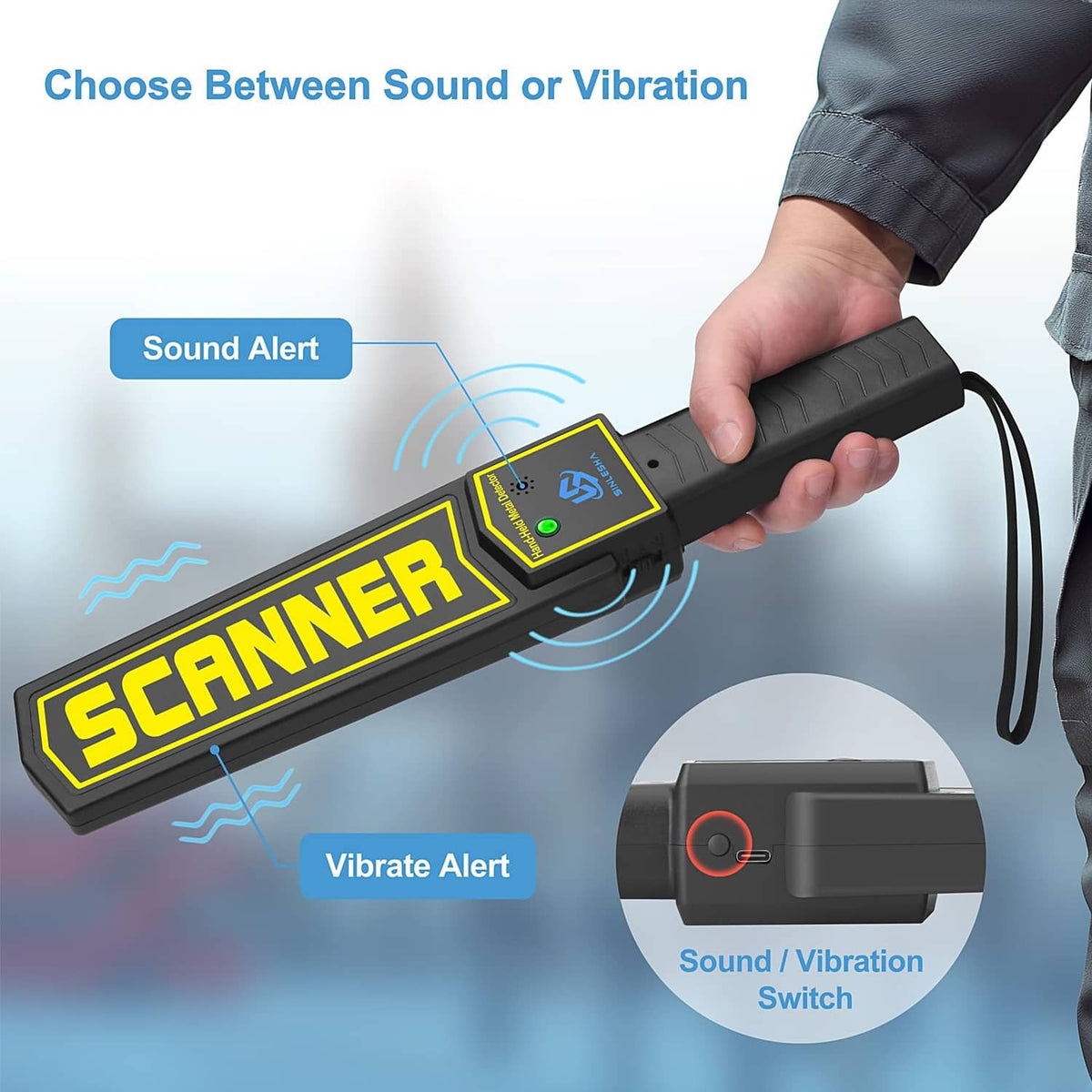 Black handheld metal detector wand showing sound and vibration alert controls