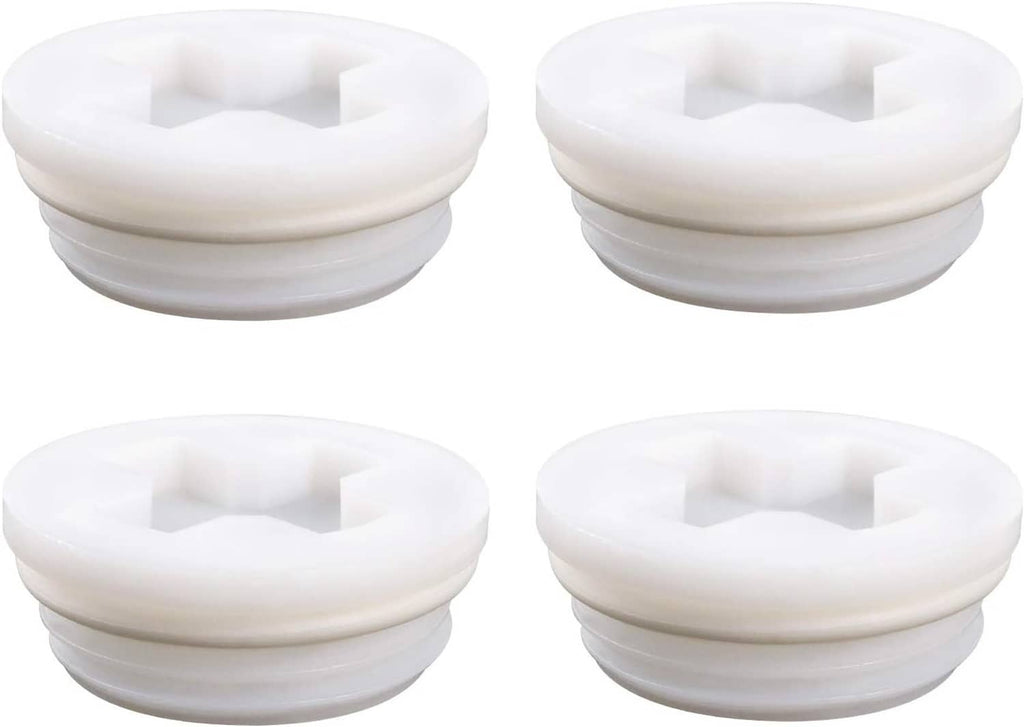 Two-by-two set of four white plastic bung caps with square/hex top slots