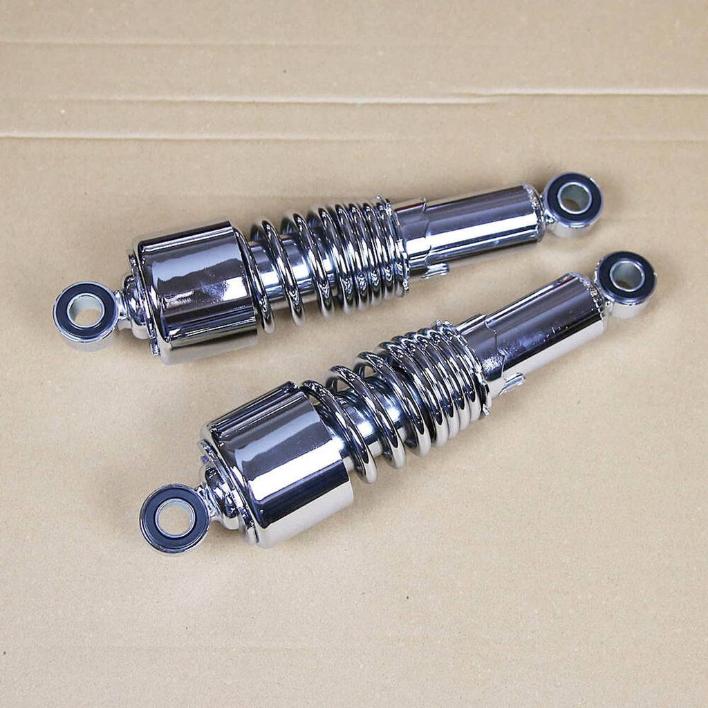 Chrome rear shock absorber pair with coiled springs and circular mounting ends