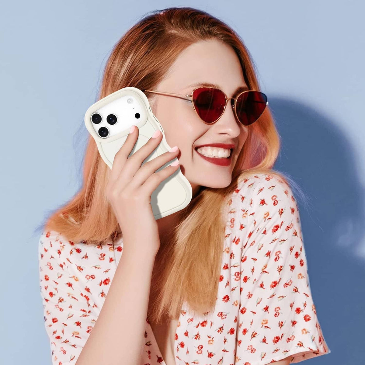 Stone cream iPhone case held in hand, showing camera cutouts