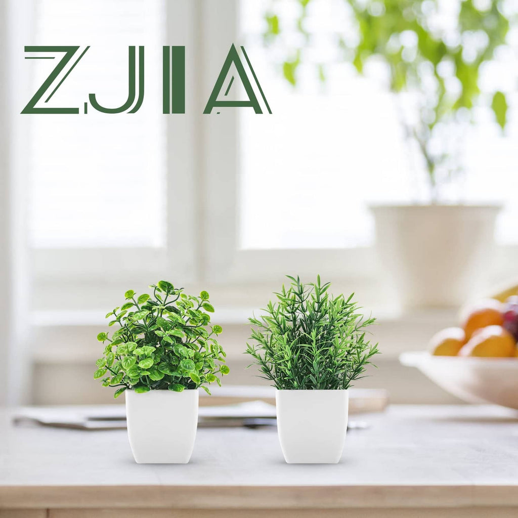ZJIA 2-pack artificial plants: two small green plants in white pots.