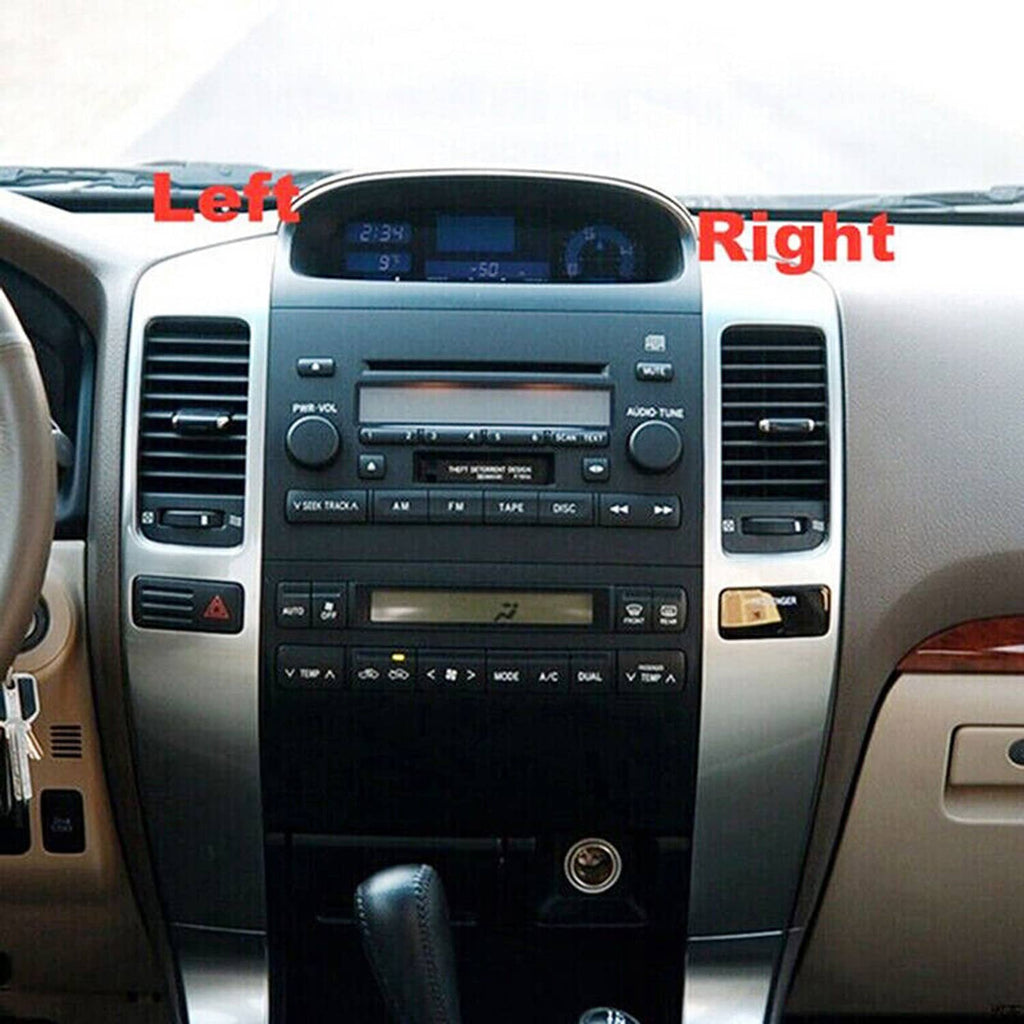 Dashboard center console with left and right air vent panels, silver and black