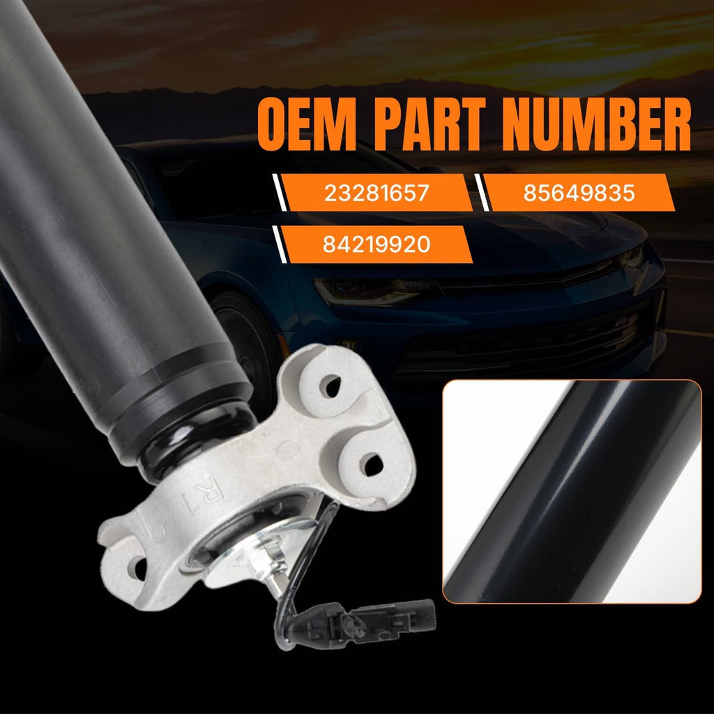 Rear shock absorber strut with silver bracket and black body, shown with part number labels