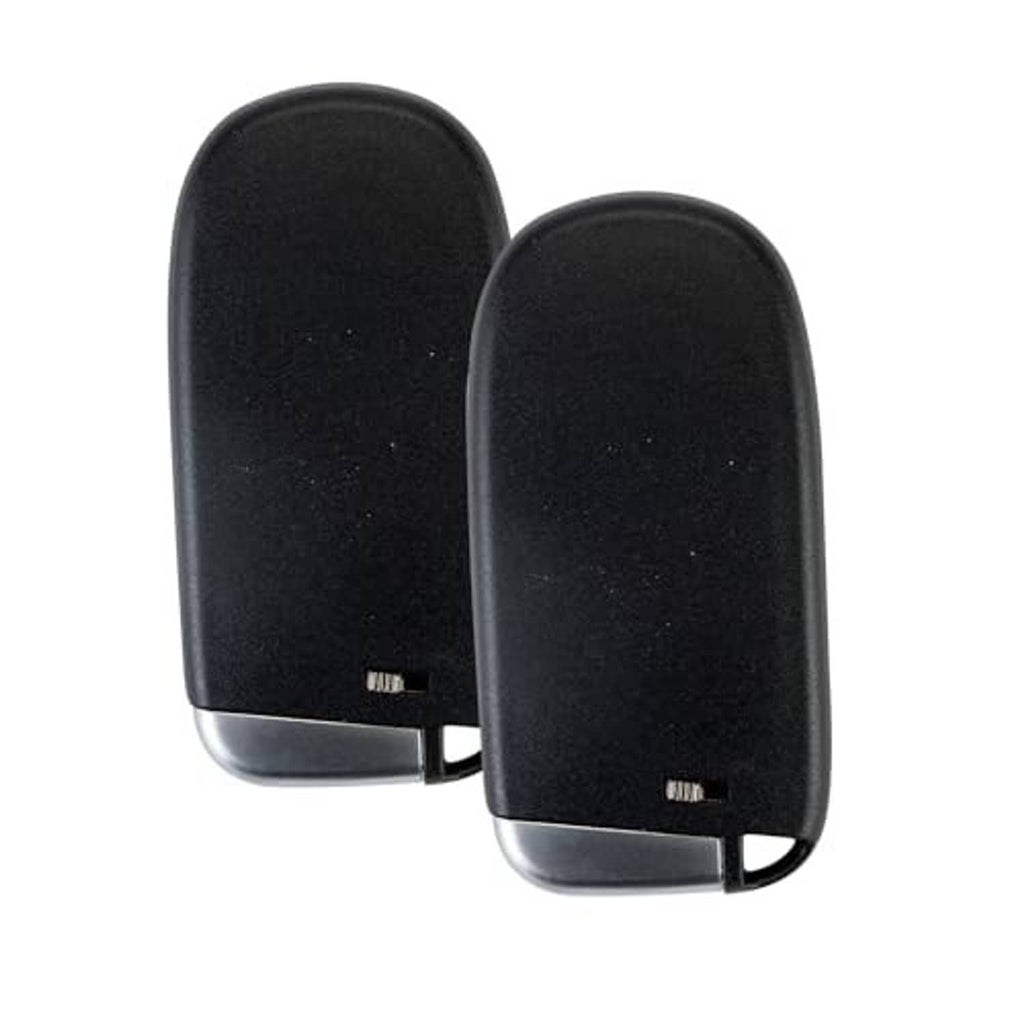 Pair of black keyless remote fobs shown from the back with small key slots