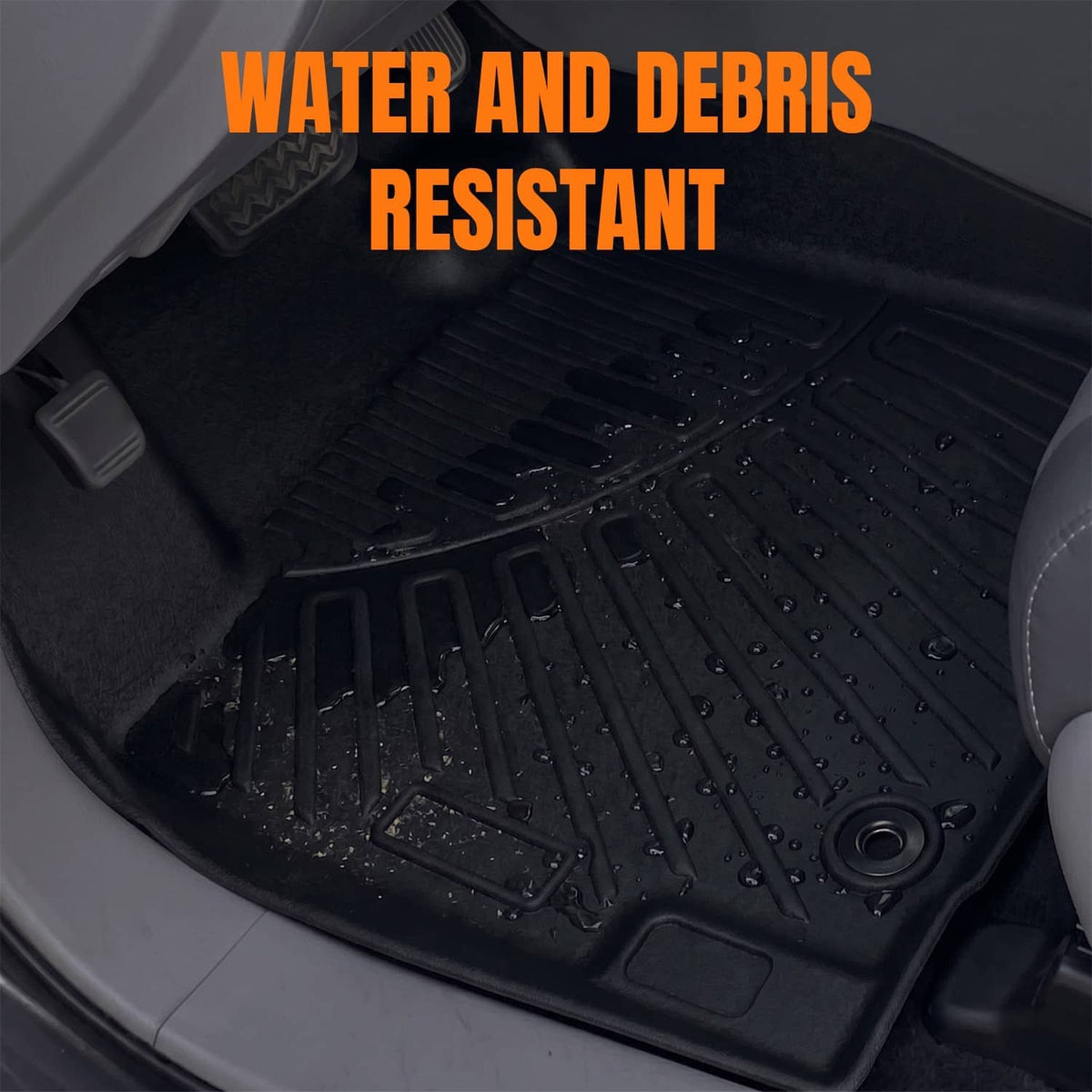 Black molded floor mat with water-shedding texture and raised grip ridges.