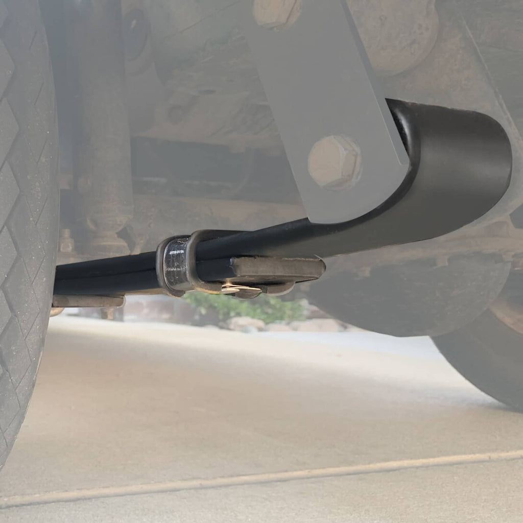 Rear leaf spring assembly under golf cart, black steel bar and bushing