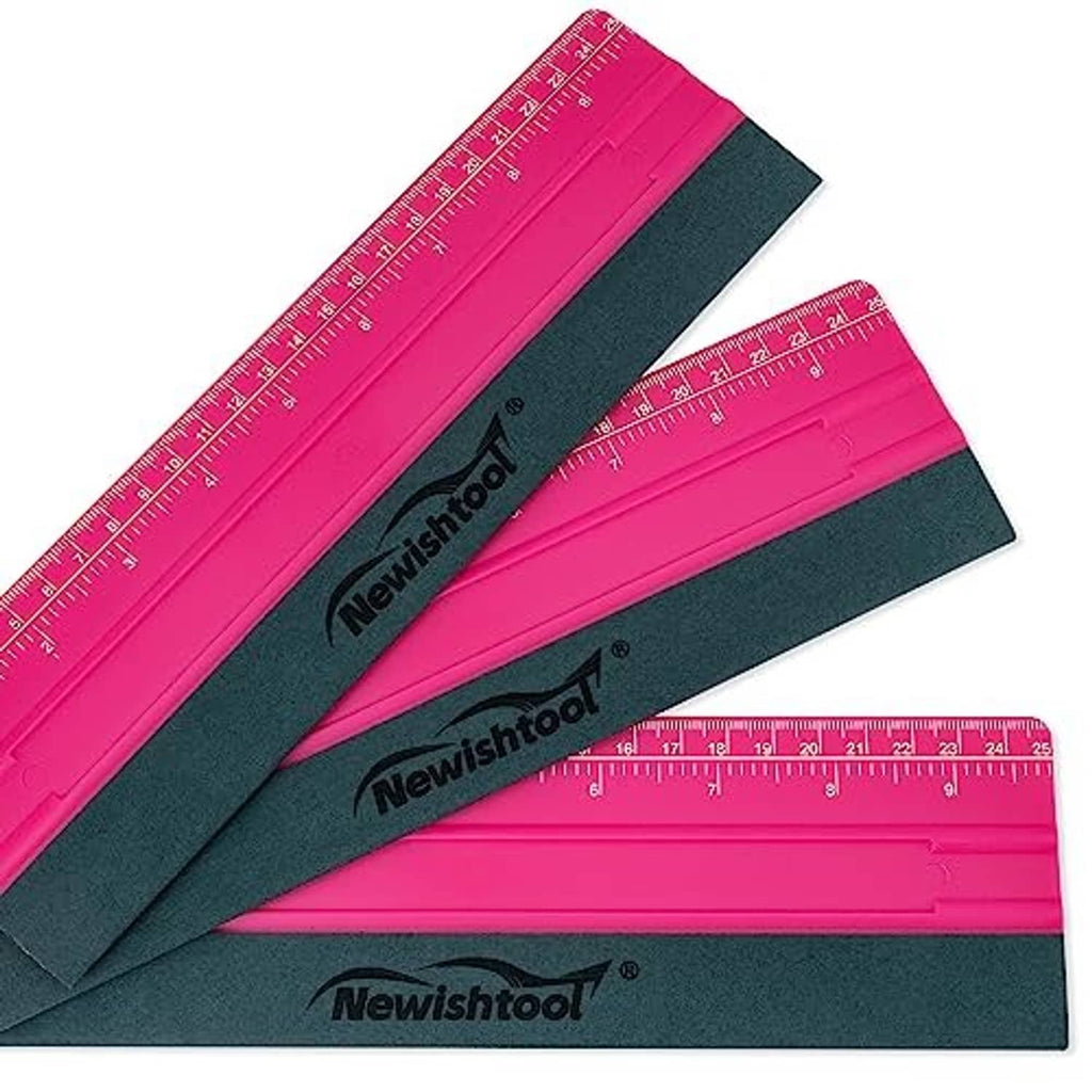 Set of rose pink and dark vinyl squeegees with ruler markings and Newishtool logo