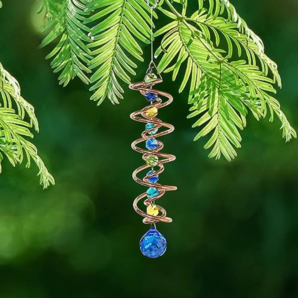 Blue-copper spiral wind spinner with blue crystal drop and multicolor glass bead loops